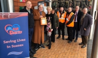 Sir Nicholas with Steve Morris, Charity Life Support Trainer and local campaigner, promoting life-saving equipment at East Grinstead Station