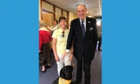 Sir Nicholas at the official opening of Age UK East Grinstead and District with Millie the therapy dog.  